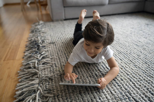 Girl lying on rug | H&R Carpets & Flooring